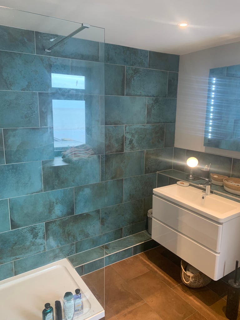 Wetroom with blue feature tiles