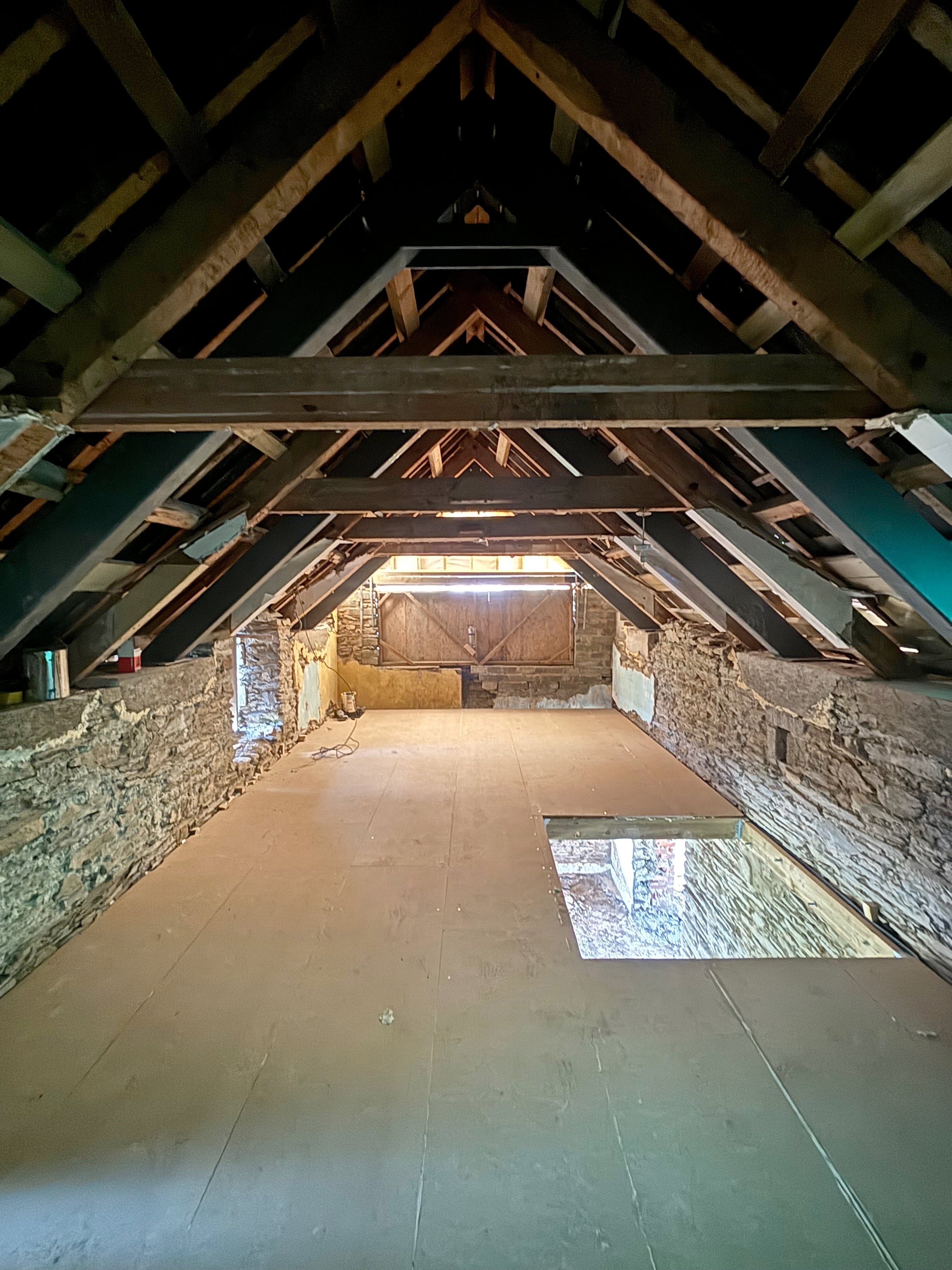 Loft conversion with exposed stone walls