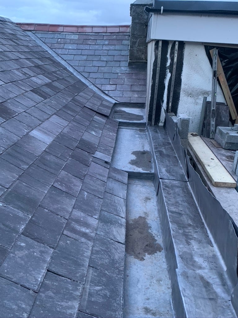 Slate roof valley and leadwork detail